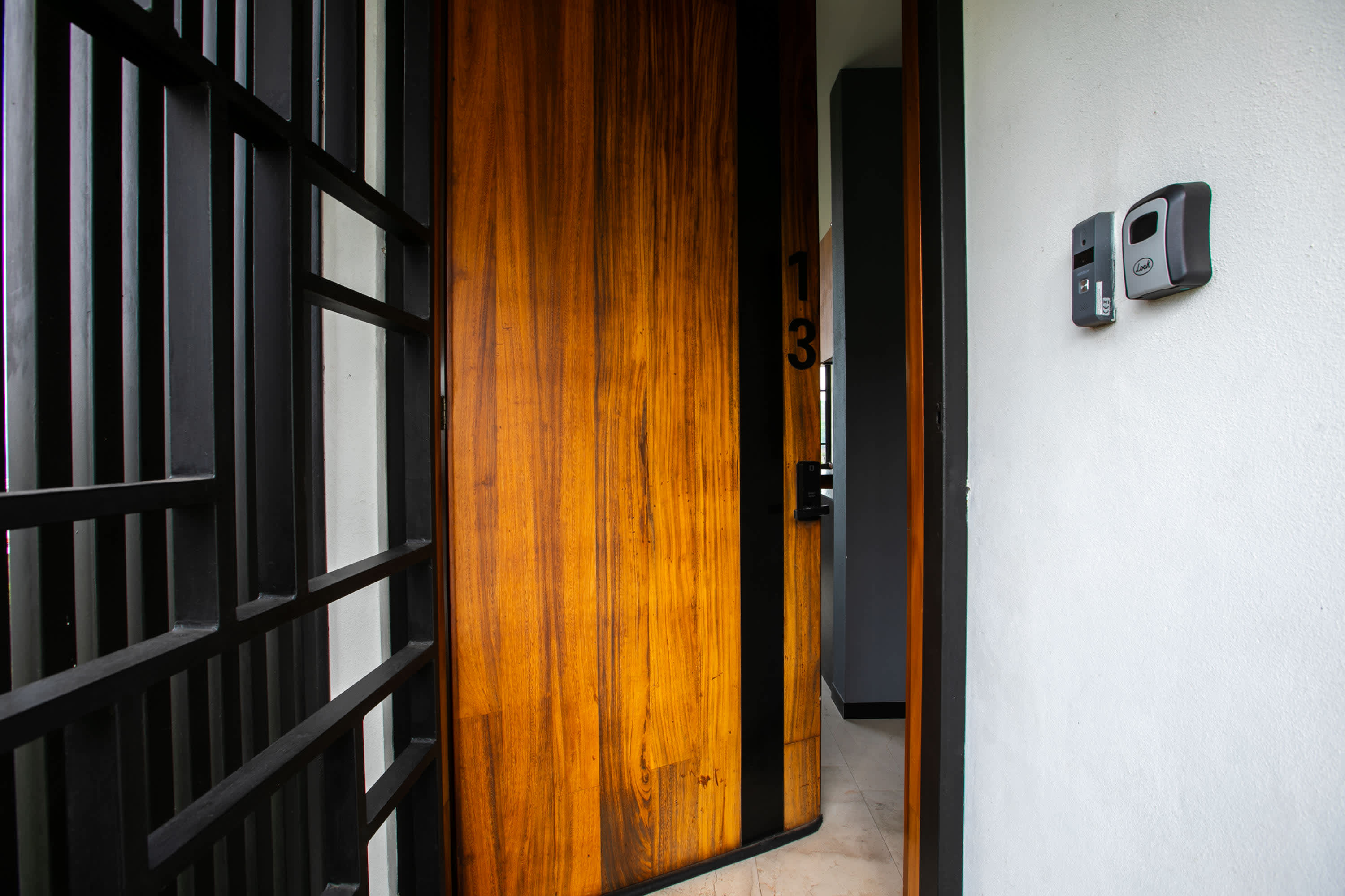 Condo 13 wood entrance door