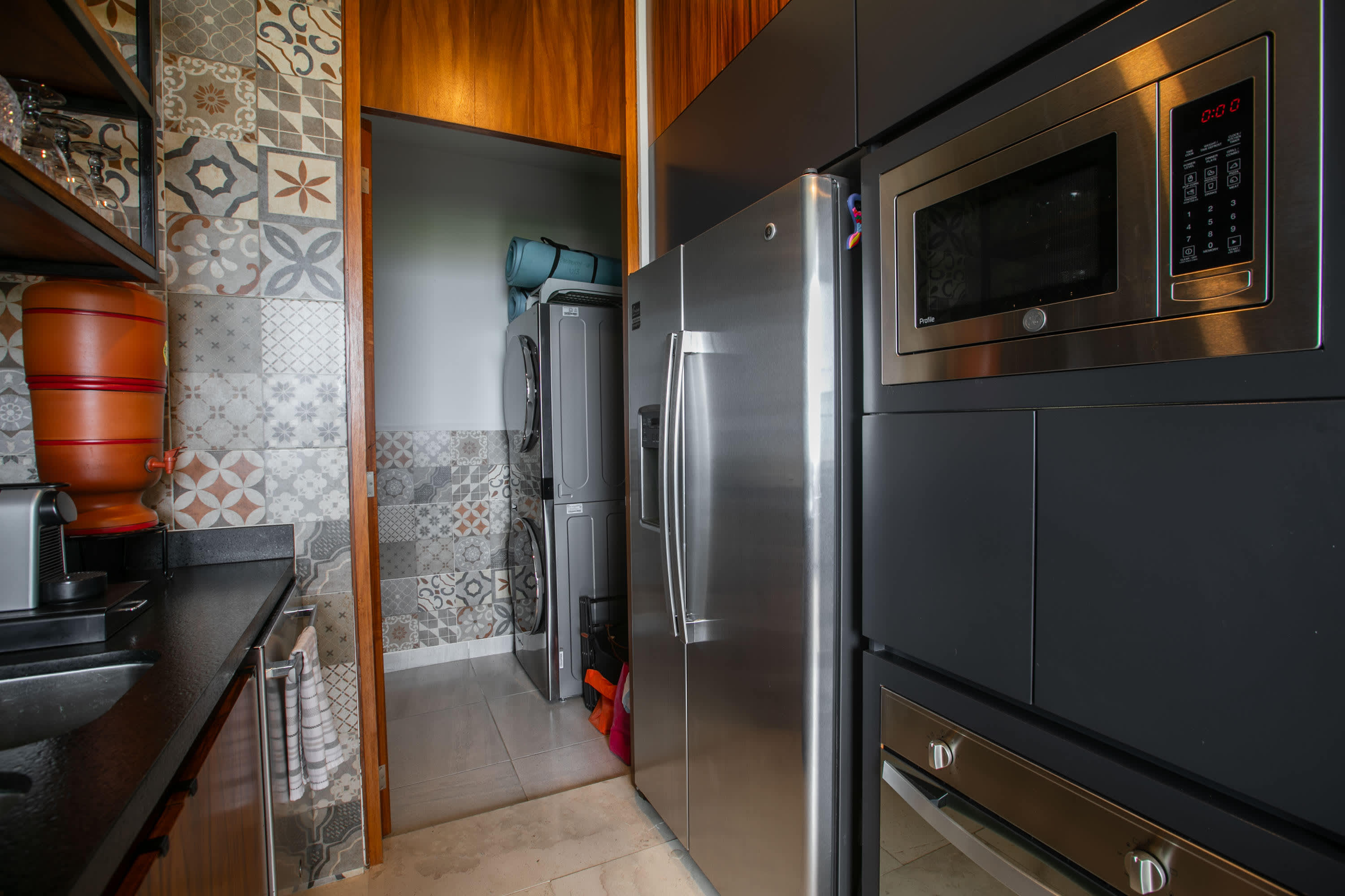 Stainless steel GE Profile refrigerator and built-in appliances